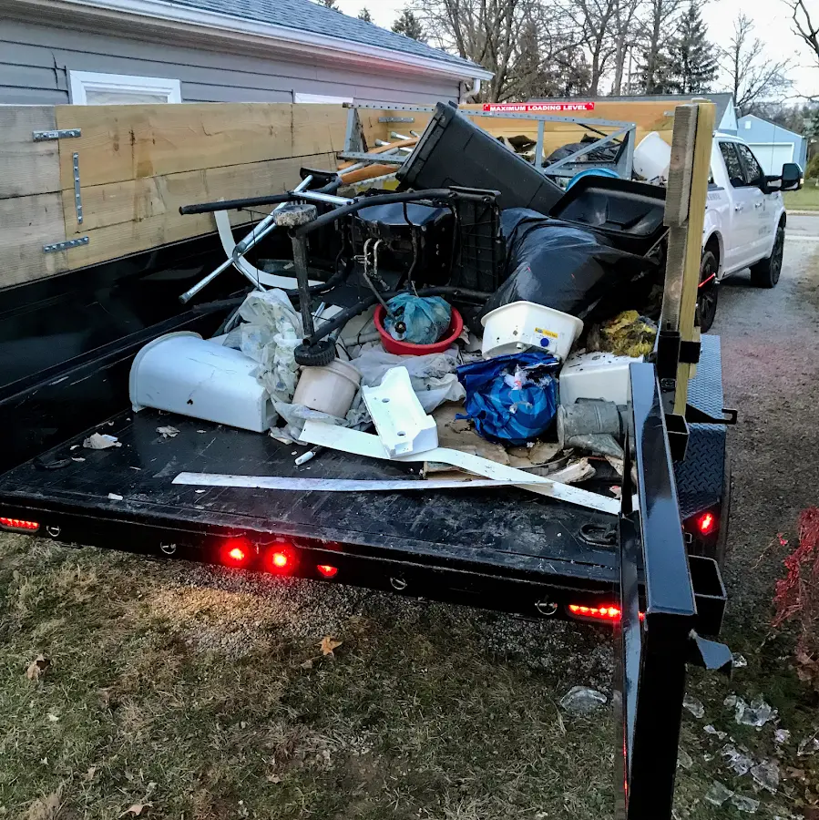 Roll-off dumpster delivered to a residential driveway in Holton