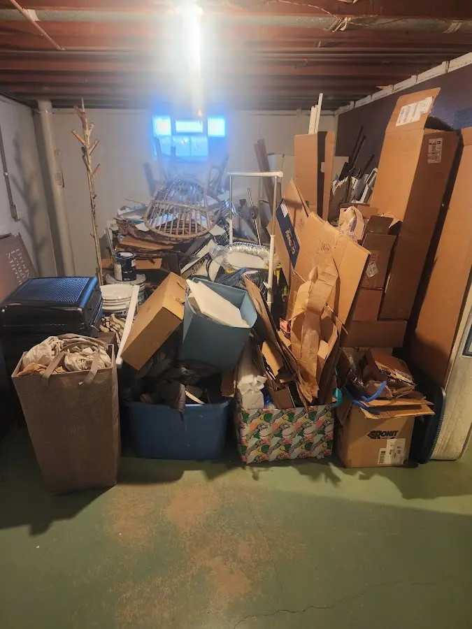 Roll-off dumpster container at job site for Concrete Dumpster Rental in Holton